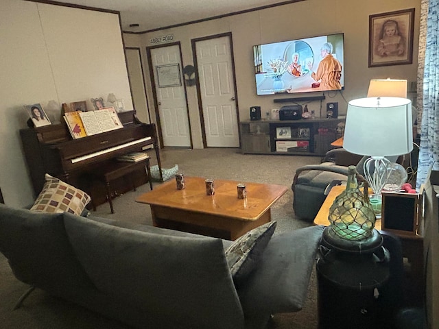 living room with carpet floors and crown molding