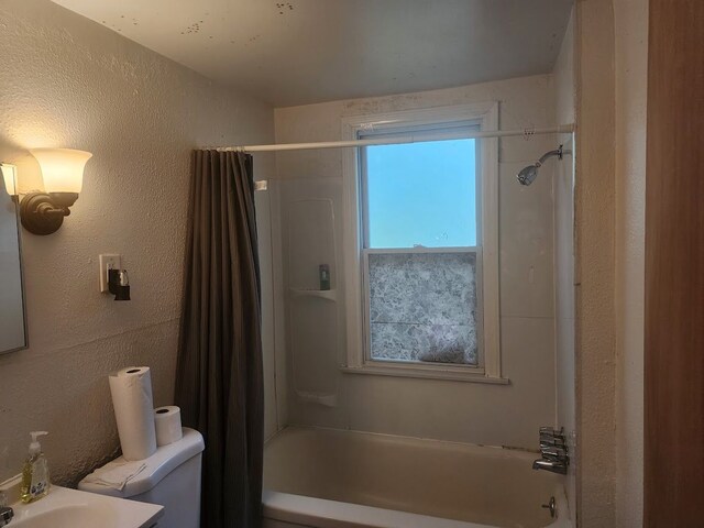 full bathroom featuring vanity, toilet, and shower / tub combo with curtain