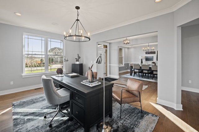 office area with ornamental molding, dark hardwood / wood-style floors, and a notable chandelier