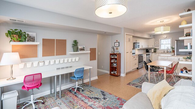 560 Little Lake Dr Unit 19, Ann Arbor, MI 48103 - living area featuring baseboards