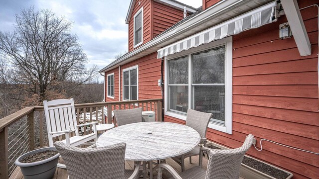 560 Little Lake Dr Unit 19, Ann Arbor, MI 48103 - wooden terrace featuring outdoor dining area