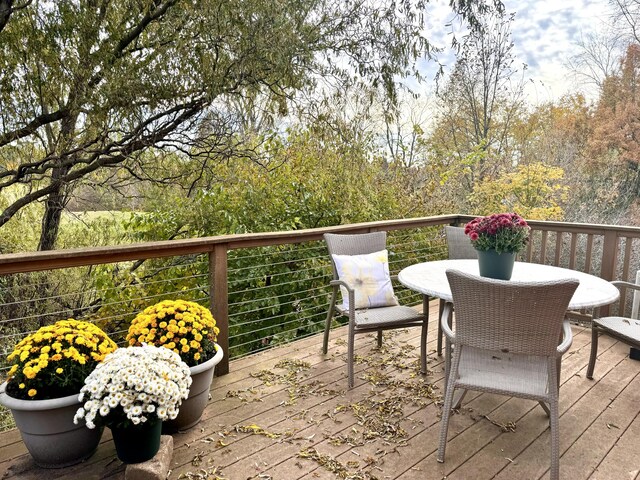 560 Little Lake Dr Unit 19, Ann Arbor, MI 48103 - wooden terrace featuring outdoor dining space