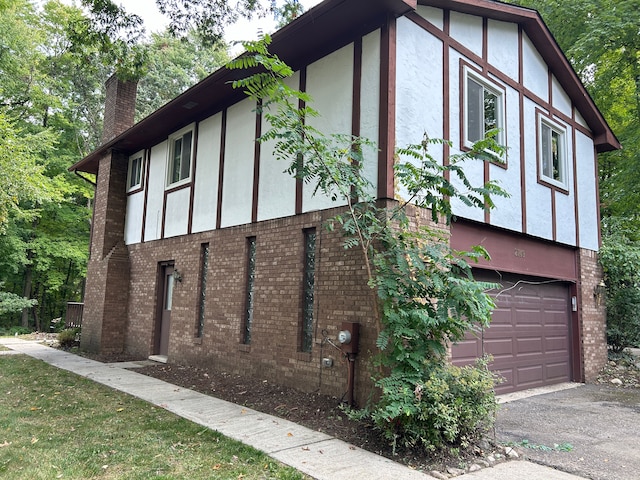 view of property exterior with a garage