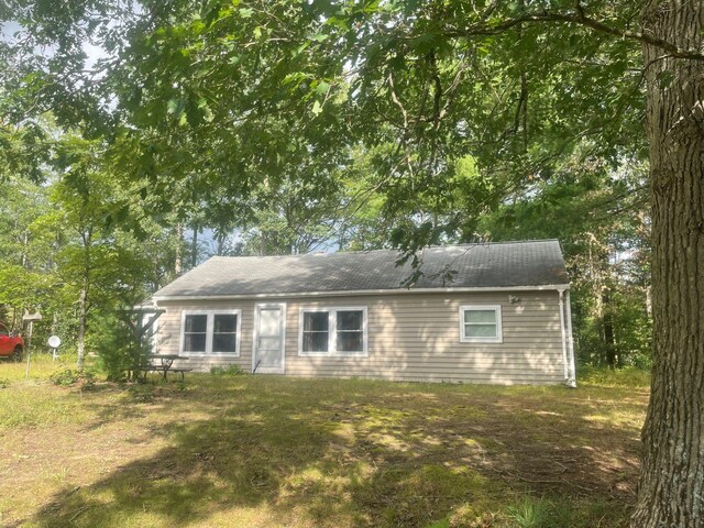10544 N Lazy Ln, Bitely, MI 49309 - view of front of house with roof with shingles