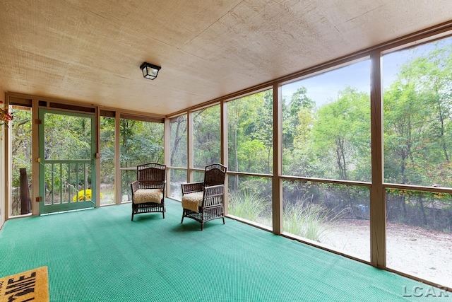 unfurnished sunroom with a healthy amount of sunlight