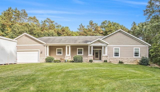 view of front facade with a garage and a front yard