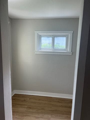 empty room featuring hardwood / wood-style floors