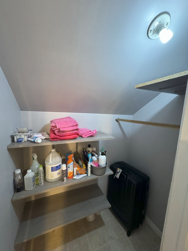 bathroom with lofted ceiling