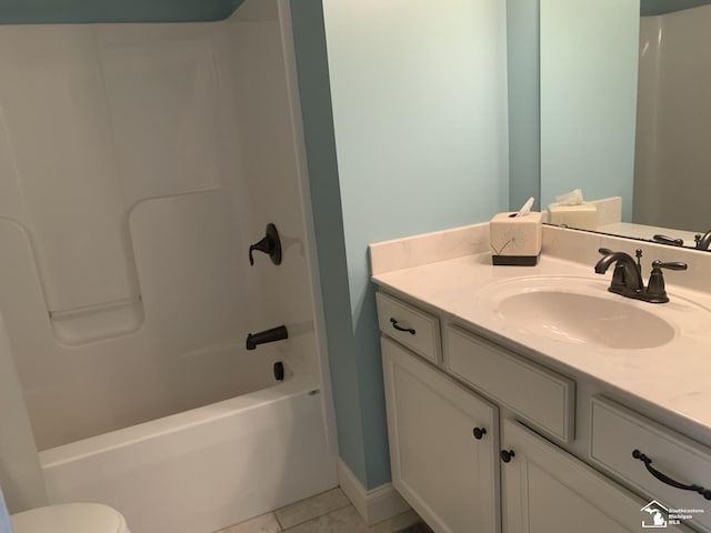 full bathroom with tile patterned floors, vanity, toilet, and tub / shower combination