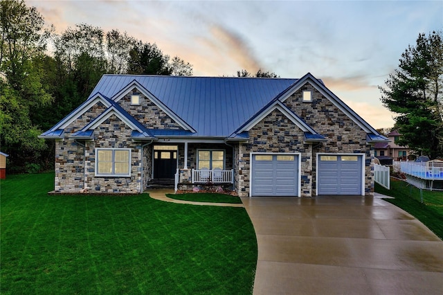 craftsman house featuring a lawn and a porch