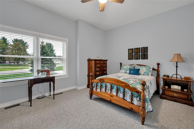 bedroom with ceiling fan and carpet floors