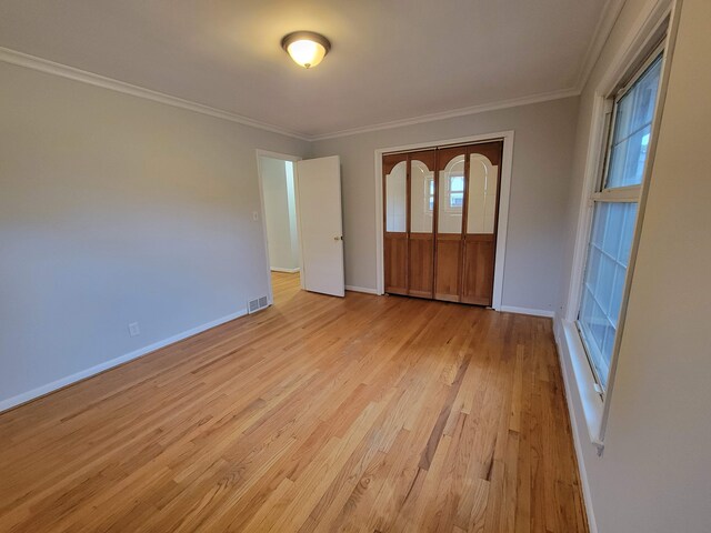 31990 Nottingwood St, Farmington Hills, MI 48334 - spare room featuring light wood finished floors, baseboards, and crown molding