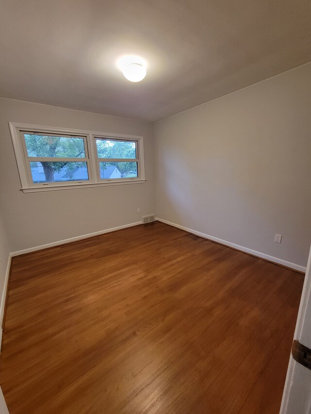 31990 Nottingwood St, Farmington Hills, MI 48334 - unfurnished room with wood finished floors and baseboards