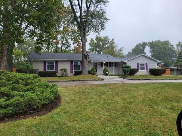 31990 Nottingwood St, Farmington Hills, MI 48334 - ranch-style house featuring driveway and a front lawn