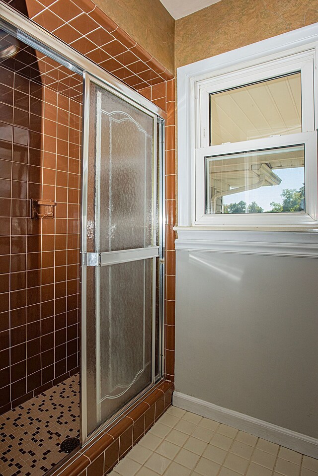 31990 Nottingwood St, Farmington Hills, MI 48334 - full bathroom featuring a stall shower, tile patterned flooring, and baseboards