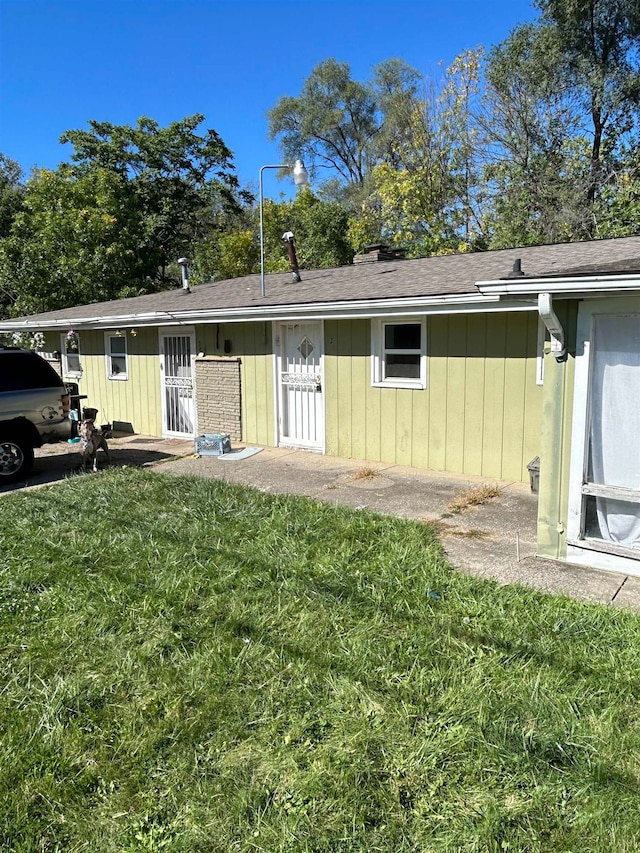 exterior space with a front yard