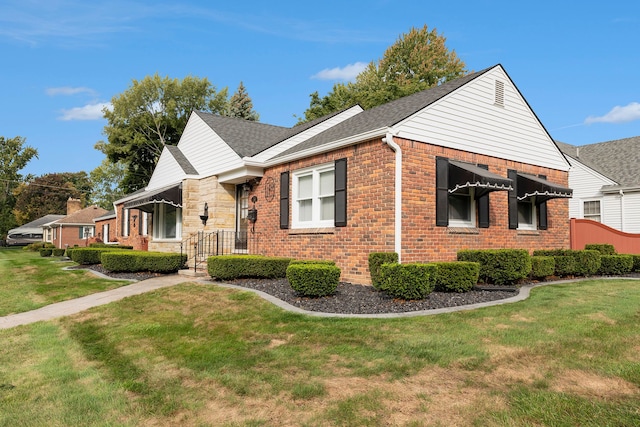 view of front of home with a front yard