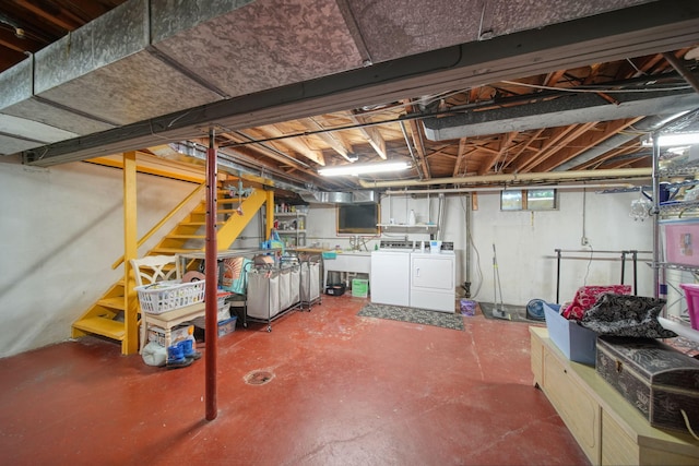 basement featuring washer and dryer