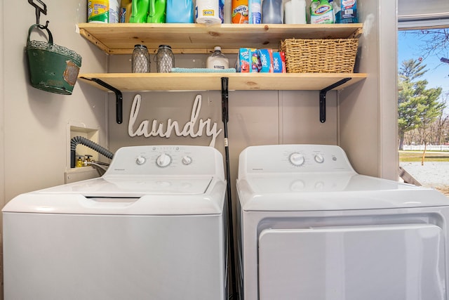 laundry room with washing machine and dryer