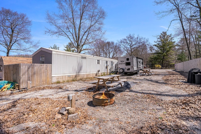 exterior space featuring a fire pit