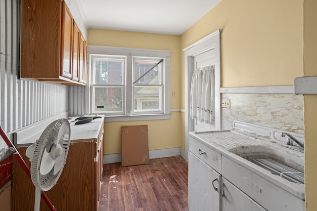 kitchen with dark wood-type flooring