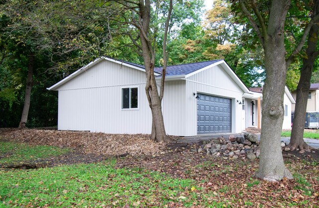 58085 Dulwich, Washington, MI 48094 - view of home's exterior featuring an attached garage
