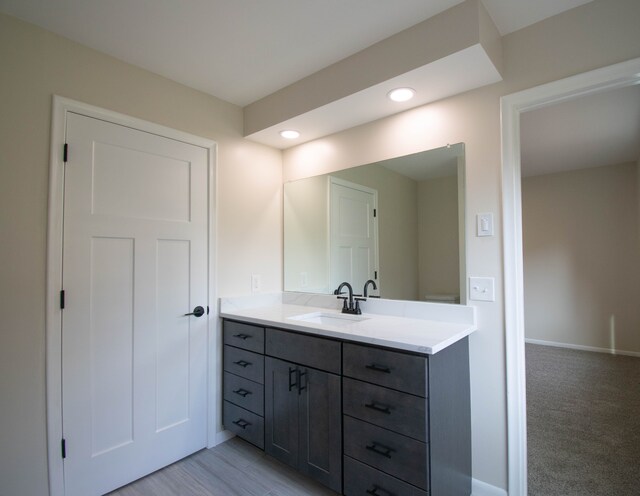 58085 Dulwich, Washington, MI 48094 - bathroom featuring vanity, recessed lighting, and baseboards