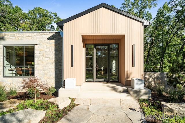 doorway to property featuring french doors