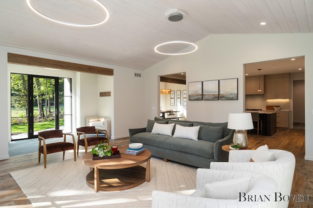 living room featuring wood-type flooring, vaulted ceiling, french doors, and wooden ceiling