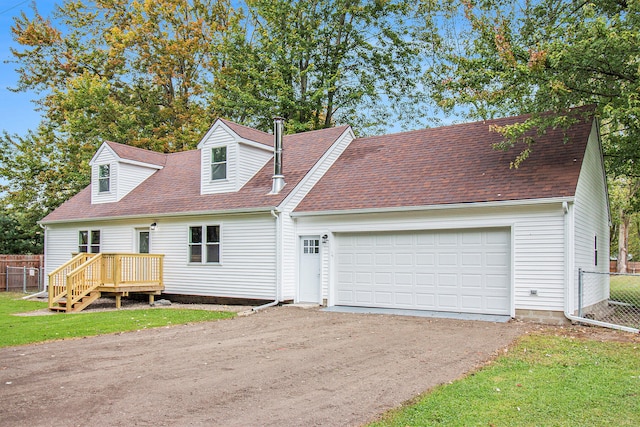 cape cod-style house with a garage