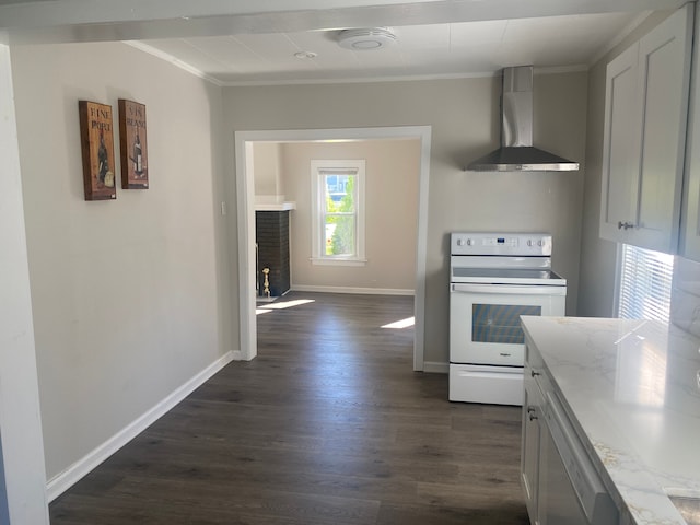 kitchen featuring dark hardwood / wood-style flooring, light stone counters, ornamental molding, wall chimney exhaust hood, and white electric stove