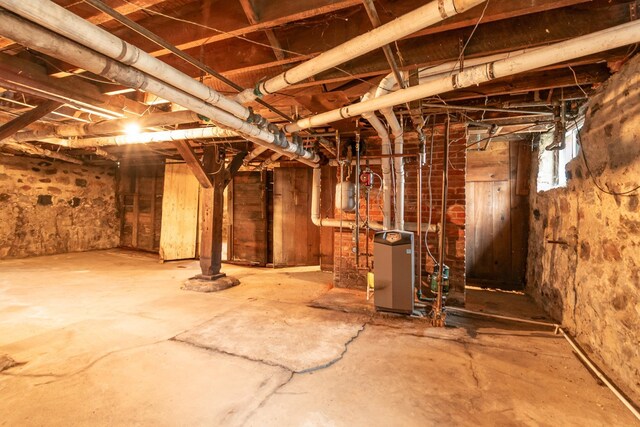 207 N Pine River St, Ithaca, MI 48847 - below grade area with a heating unit