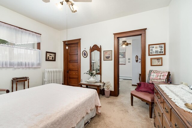 207 N Pine River St, Ithaca, MI 48847 - bedroom featuring radiator heating unit and light colored carpet