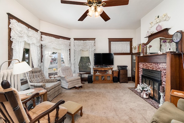 living room featuring ceiling fan and light colored carpet