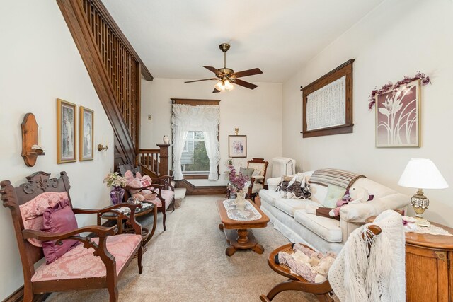 207 N Pine River St, Ithaca, MI 48847 - living room with carpet flooring, a ceiling fan, and stairway