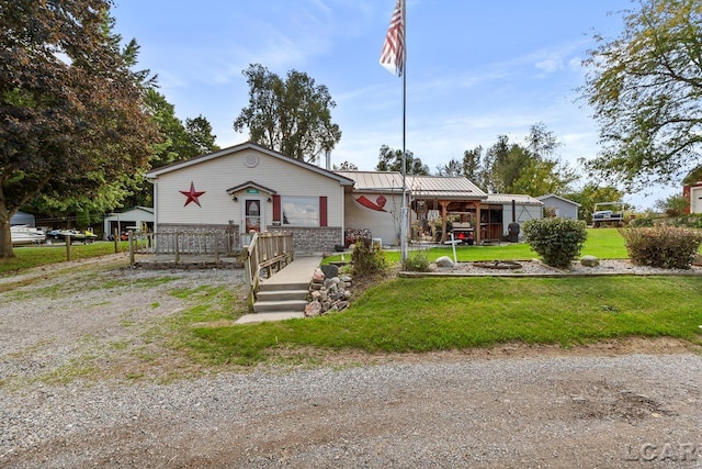 view of front of property with a front lawn