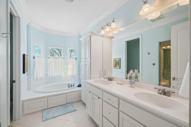 full bath with a sink, a bath, crown molding, and tile patterned flooring