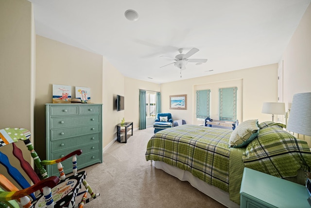 bedroom featuring ceiling fan, baseboards, and light carpet