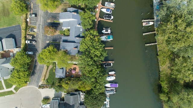 drone / aerial view with a water view