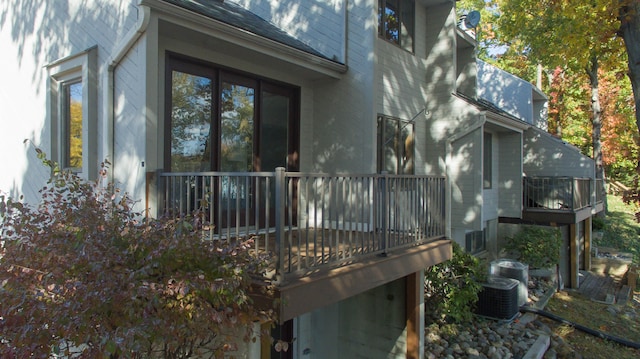 view of home's exterior with cooling unit