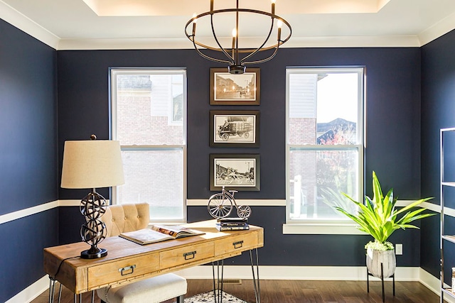 office area with dark hardwood / wood-style flooring, a notable chandelier, and ornamental molding