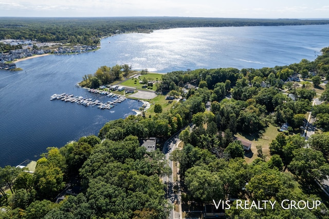 birds eye view of property featuring a water view