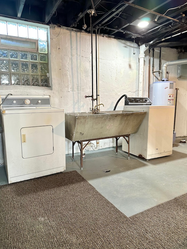 laundry room featuring washer / dryer, sink, and gas water heater