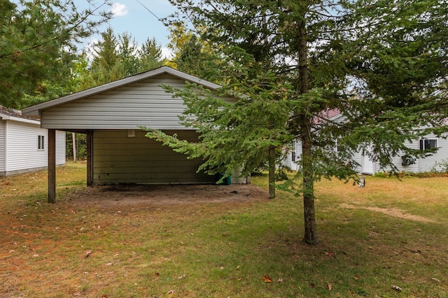 1758 W Nestel Rd, Prudenville, MI 48651 - view of home's exterior with a lawn