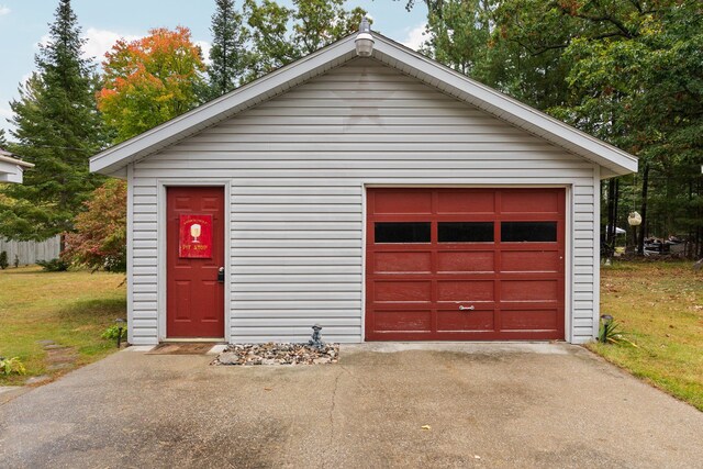 1758 W Nestel Rd, Prudenville, MI 48651 - detached garage featuring driveway