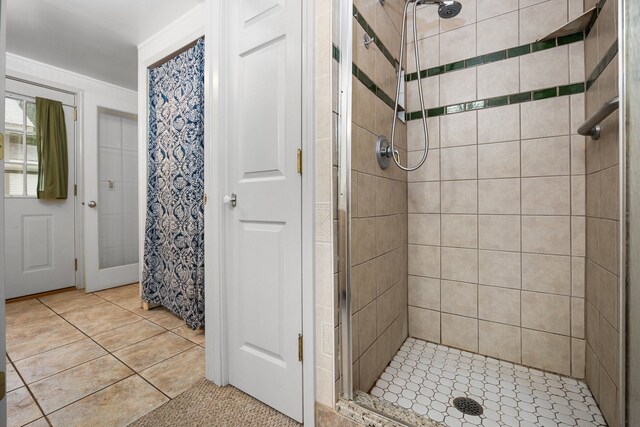 1758 W Nestel Rd, Prudenville, MI 48651 - full bath featuring a shower stall and tile patterned flooring