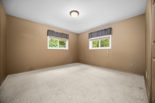 empty room featuring carpet flooring