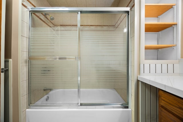 bathroom featuring enclosed tub / shower combo