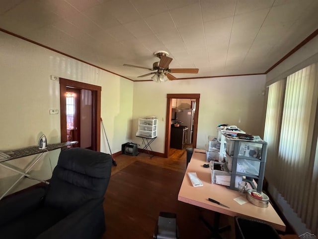 interior space featuring hardwood / wood-style floors, ceiling fan, and ornamental molding