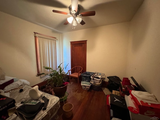 bedroom featuring ceiling fan and wood-type flooring